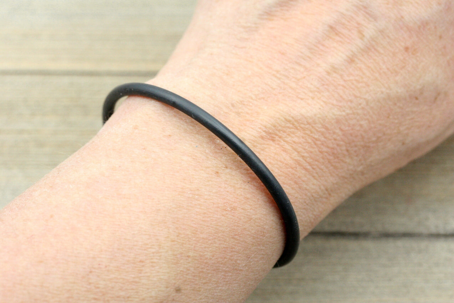 This bracelet comes in 3 sizes.
Small has an inner width of 2-1/4 inches and should fit up to a 6 1/2 inch wrist
Medium an inner width of 2-7/16 inches and should fit up to a 7 inch wrist
Large an inner width of 2-3/4 inches and should fit up to a 8 inch wrist