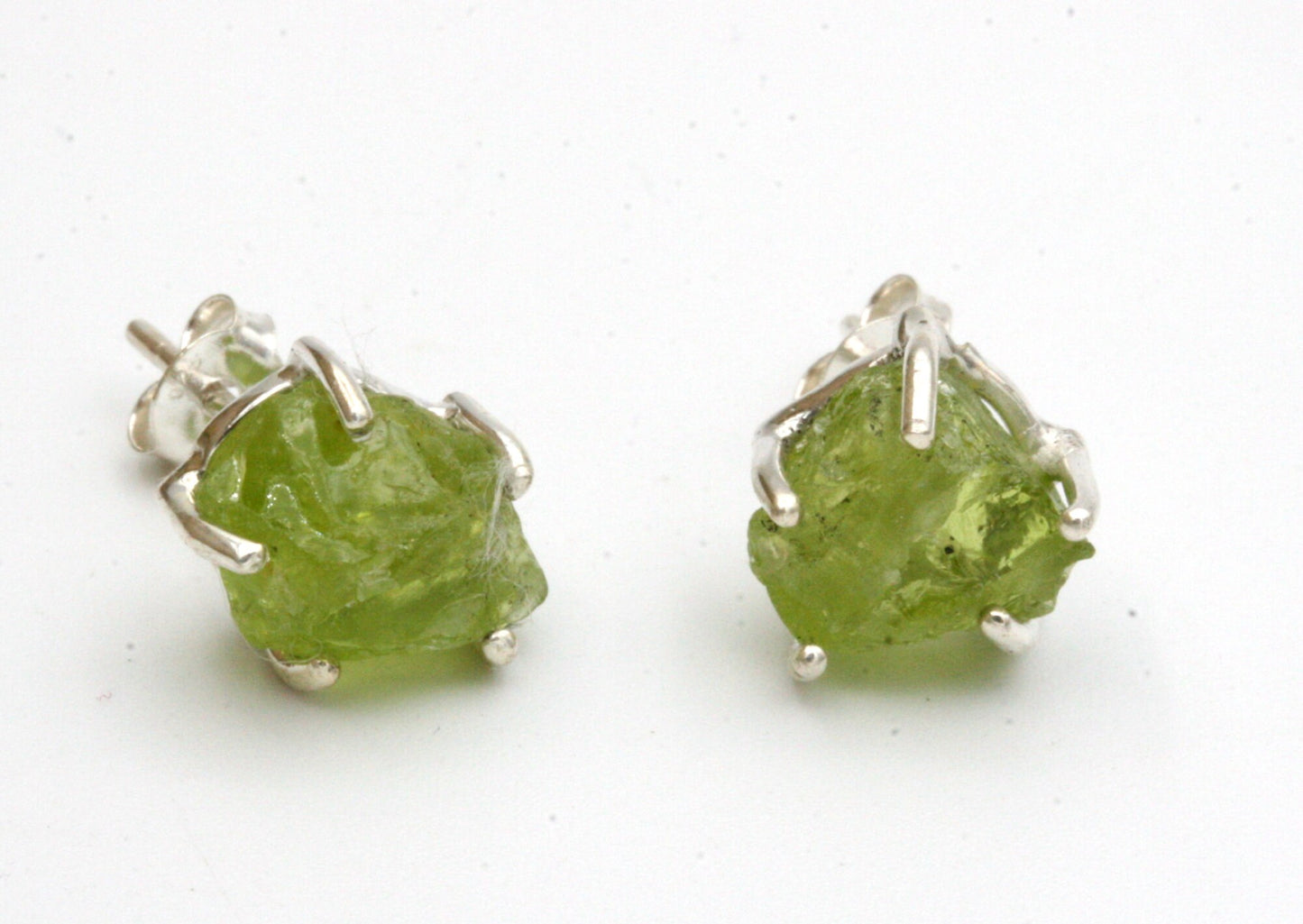 Raw Peridot Stud Earrings with Rhodium Plating