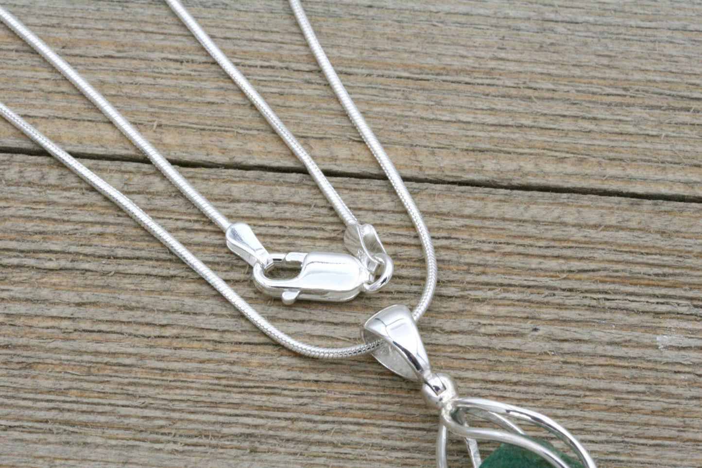 Raw Emerald Cage Pendant