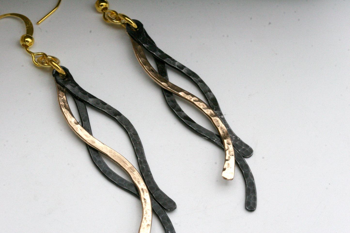 Handmade Iron and Bronze Wave Earrings – Textured Hammered Design