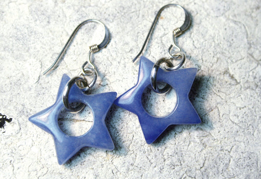 Amazonite blue star beads are the focus of these adorable drop earrings.

The stars measure approximately 3/4 across
I finished these off with sterling silver ear wires.