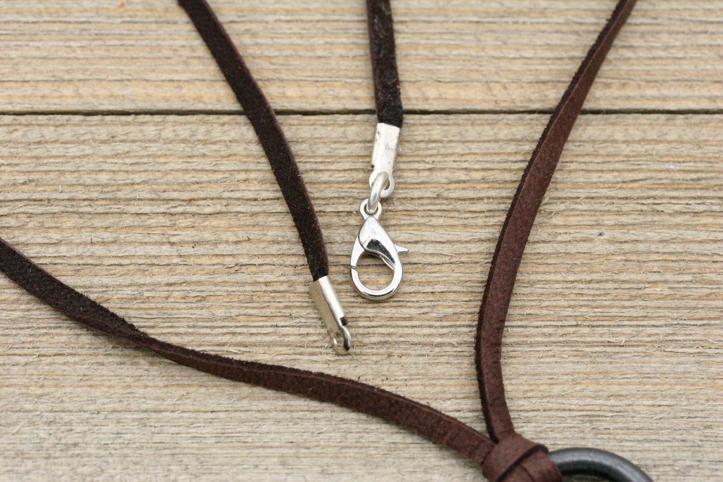 Small Iron Spiral with leather Cord Necklace