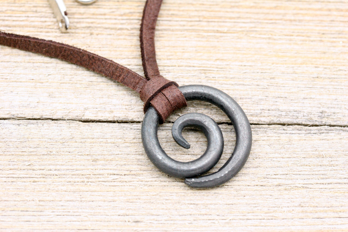 Small Iron Spiral with leather Cord Necklace