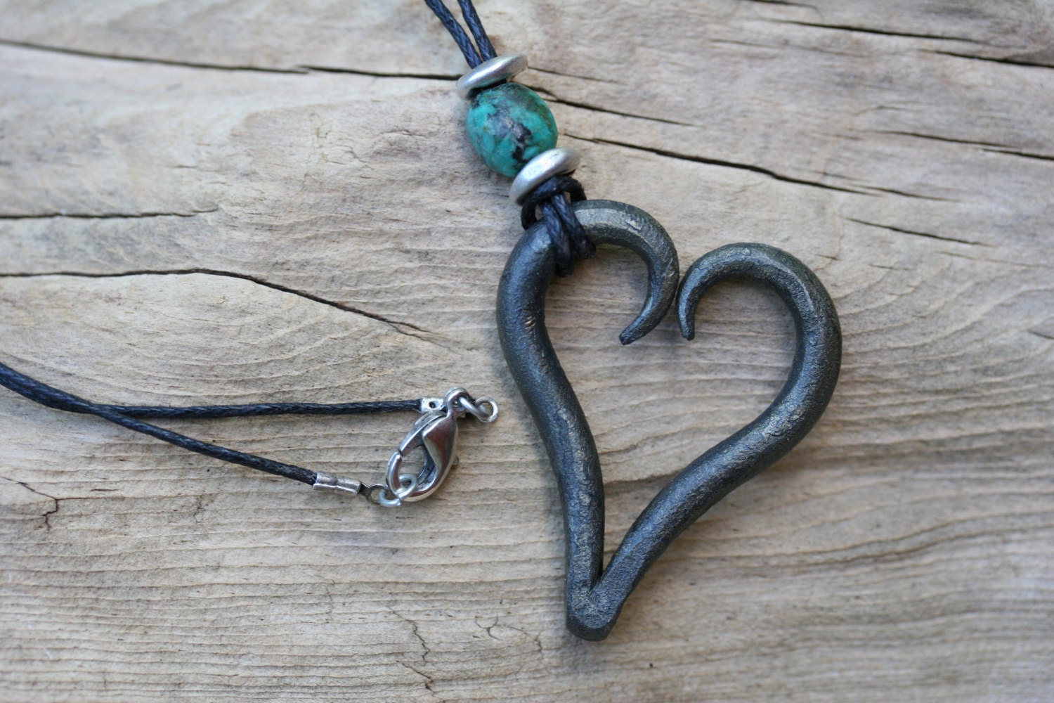 Iron heart pendant with turquoise bead